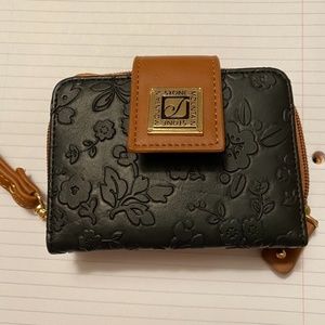 Stone Mountain black leather wallet embossed with floral pattern